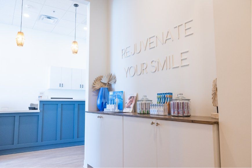Rejuvenate your smile sign above dental treatment products